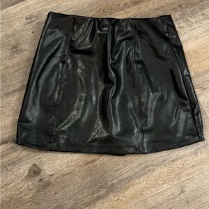 Abercrombie and fitch faux leathered skirt with attached shorts.